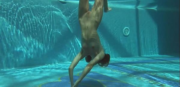  Irina Russaka strips naked in the swimming pool
